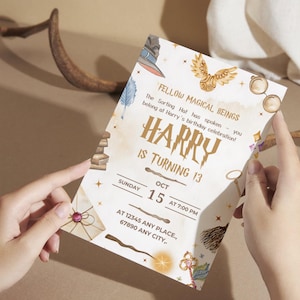 May include: A birthday invitation with a Harry Potter theme. The invitation features the text "HARRY IS TURNING 13" in gold lettering, along with other text and illustrations of a sorting hat, a golden snitch, and a wand. The invitation is held by two hands.