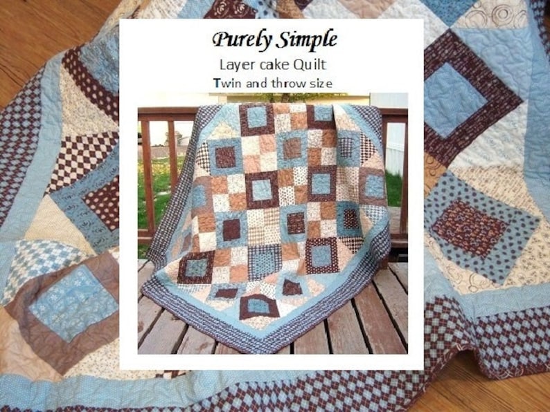 May include: A blue, brown, and cream quilt with a layer cake design. The quilt is labeled "Purely Simple Layer Cake Quilt Twin and Throw Size".