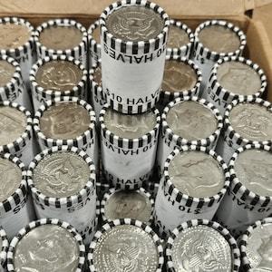 Unsearched Roll of Kennedy half dollars, Fed tight rolls.