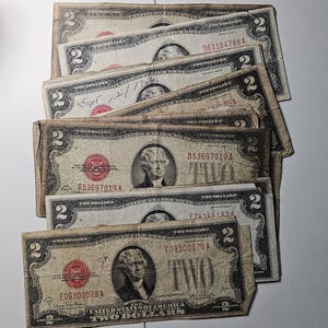 1928 heavily circulated 2 dollar bill, US treasury RED SEAL note