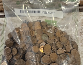 7lb Sealed bag of 1909-1958 Lincoln wheat cents.  They may contain Indian heads.  Unsearched