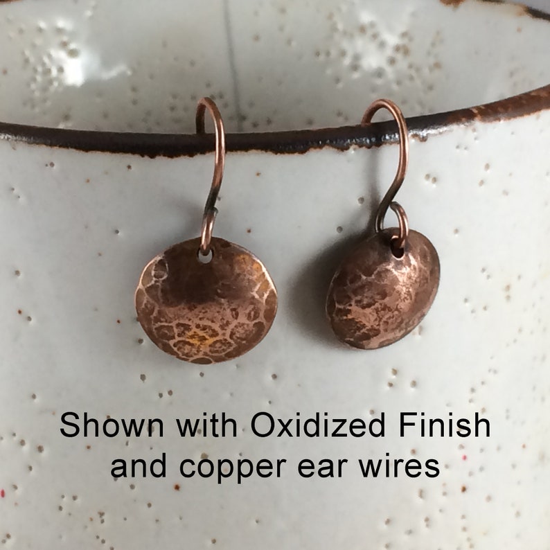 Small hammered copper domed disc earrings in oxidized finish with copper ear wires