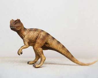 Photograph of Toy Allosaurus Dinosaur | Kids Room and Nursery Wall Art