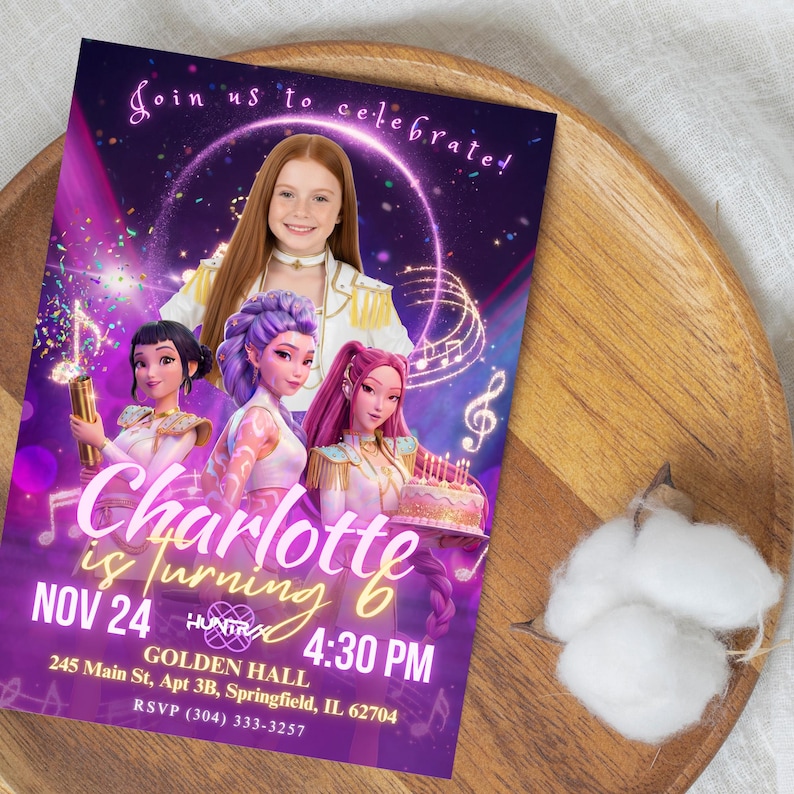 May include: A purple birthday invitation with the text "Join us to celebrate!" and "Charlotte is turning 6". The invitation features illustrations of girls and musical notes. The date and time are also included.