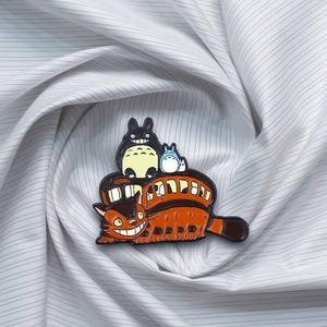 Épingle d'anniversaire de dessin animé d'amis de bus de chat
