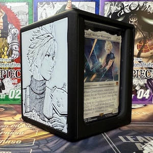 May include: Black card storage box with a white embossed image of a Final Fantasy VII character. The box holds a Magic: The Gathering card with the text "Cloud, Midgar Mercenary". The box is designed to hold trading cards.