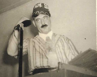 Original Vintage Photo - Small Photo of a Man in Short Sleeved Striped Suit and Brimless Hat (Fraternal Order?) Standing at Podium - 1940s