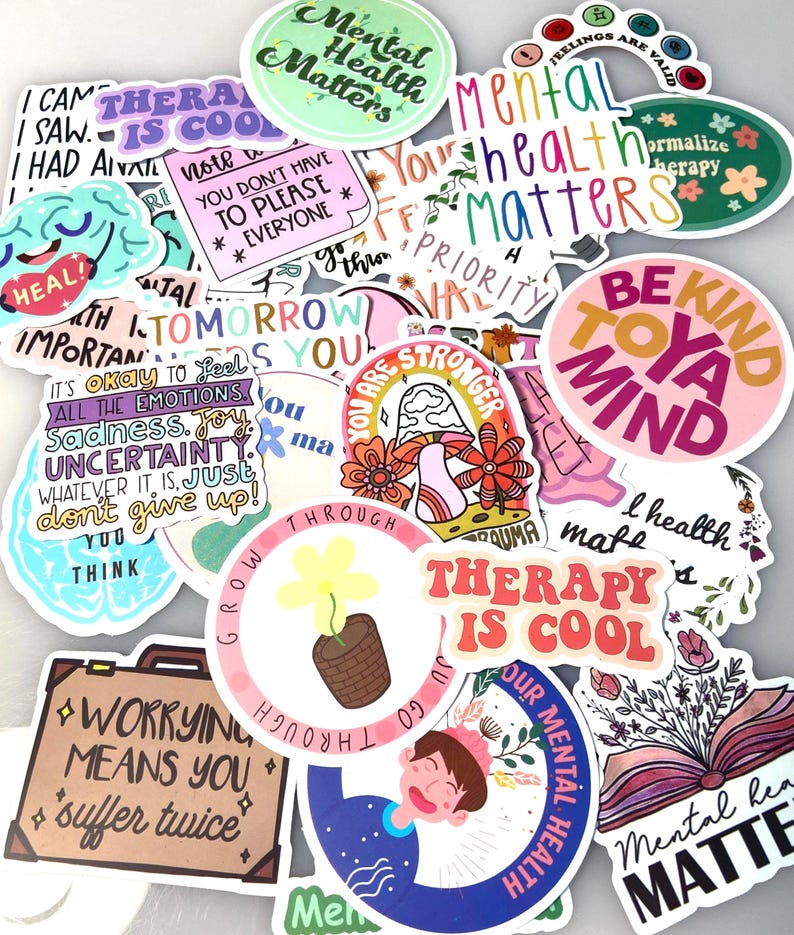 May include: A collection of colorful stickers with mental health themes. The stickers feature various designs, including motivational quotes, illustrations, and the phrases "Mental Health Matters" and "Therapy is Cool."