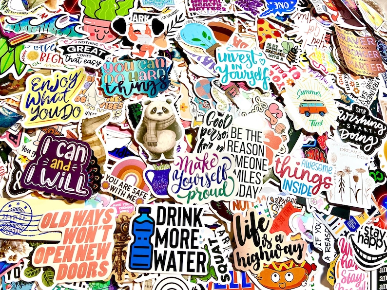 May include: A collection of colorful stickers with various inspirational and motivational messages. The stickers feature a variety of designs, including animals, plants, and abstract patterns. Some of the messages include "Enjoy What You Do", "Make Yourself Proud", "Drink More Water", and "Life is a Highway".