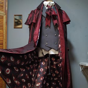 Abrigo de Alucard Hellsing para cosplay, estampado con forro de ojos, patrón exclusivo, hecho a medida.