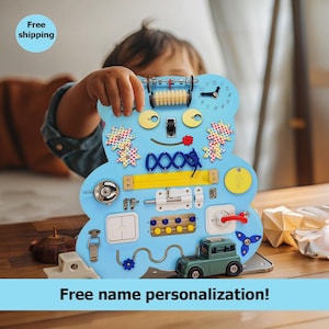 Tableau d'apprentissage sensoriel pour les tout-petits - Cadeau parfait pour les enfants de 1 an, jouet d'activité amusant et éducatif, développement de la motricité fine.