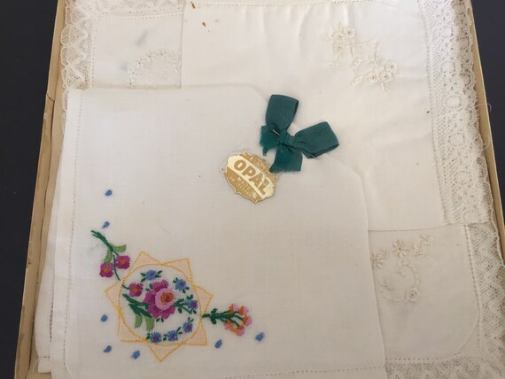 Two old handkerchiefs embroidered white cotton hands in their original box