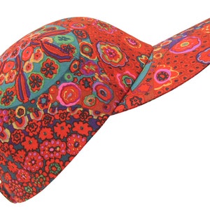 May include: A red, blue, and green patterned baseball cap with a curved brim.