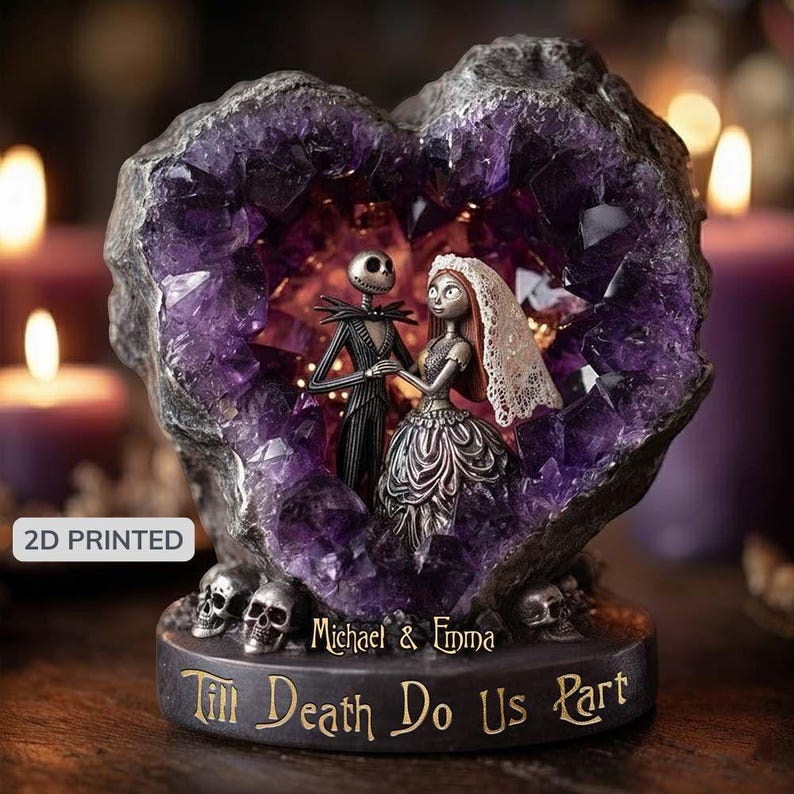May include: A heart-shaped amethyst geode sculpture featuring Jack and Sally from The Nightmare Before Christmas. The base reads "Till Death Do Us Part" with the names "Michael & Emma" above. Skulls are at the base. The sculpture is 2D printed.