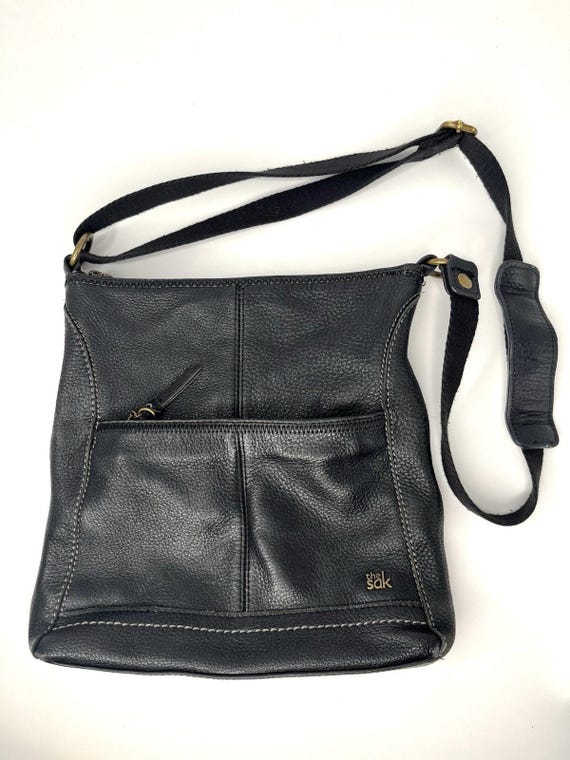 Bolso bandolera Sak Purse Iris de piel negra con correa ajustable