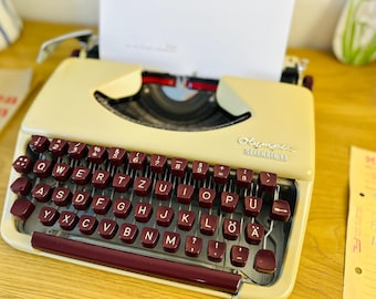 70年代ヴィンテージ！　OLYMPIA社製タイプライター　希少品 ヴィンテージ OLYMPIA タイプライター、60 年代のオフィス装飾 - Etsy 日本