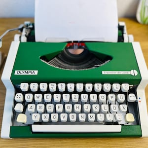 Máquina de escribir Olympia Traveller de Luxe, color verde, excelente estado, estuche original