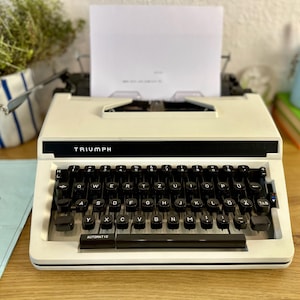 Vintage typewriter Triumph Gabriele 10 Made in Japan 1970s fully functional German quality Typewriter  Retro design Manual typewriter