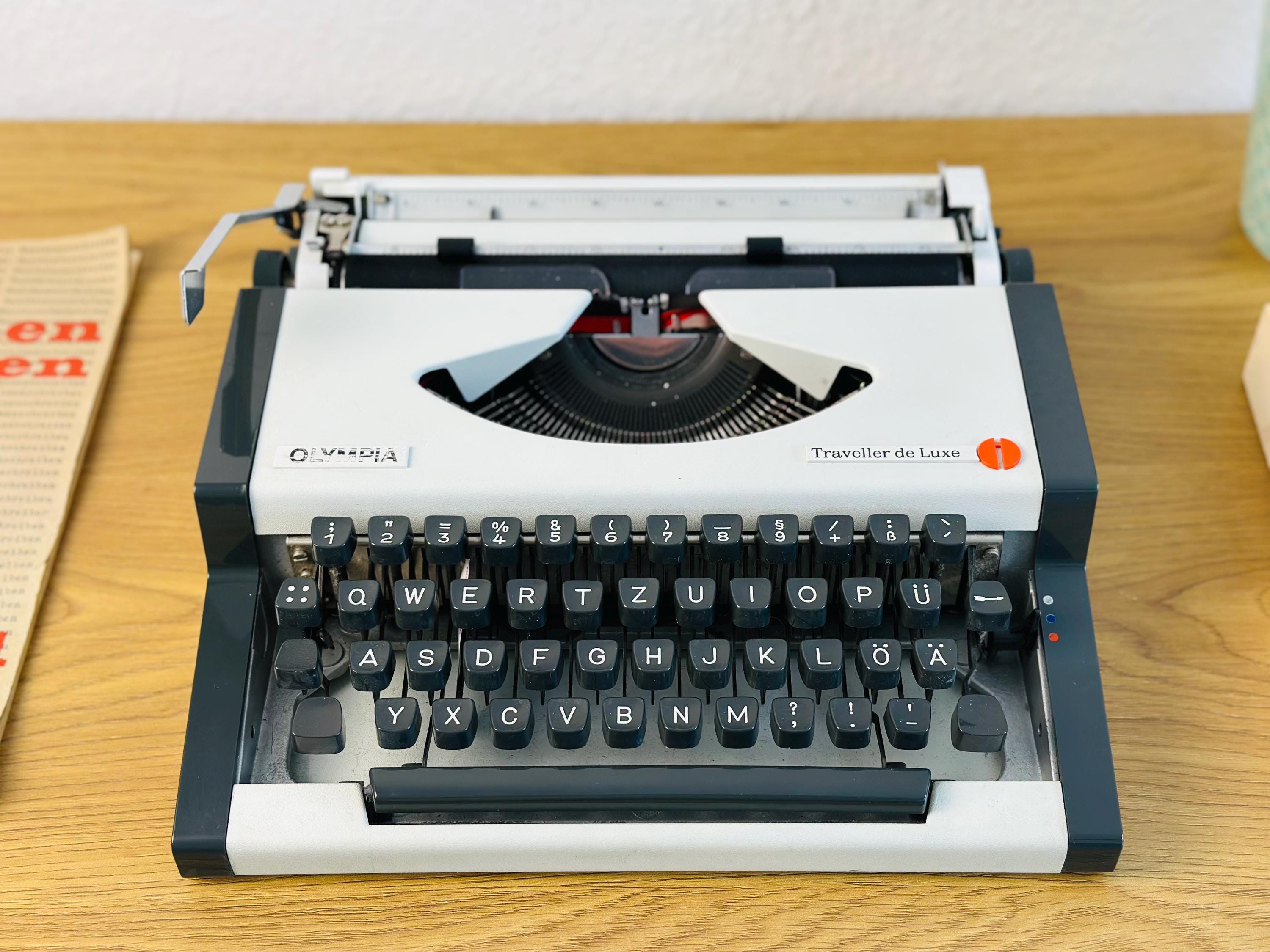 オリンピア トラベラー デ リュクス：ホワイト ヴィンテージ