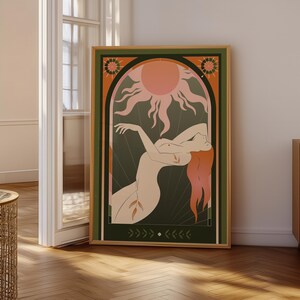 Large Celestial Sun Goddess art print leaning on floor near doorway in bright room, showing statement wall art scale.