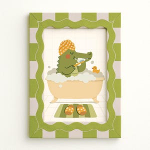 May include: A framed illustration of an alligator in a bathtub, brushing its teeth. The alligator wears a shower cap and is surrounded by bubbles. The frame is green with a wavy edge and a striped pattern. A rubber duck and slippers are also in the image.
