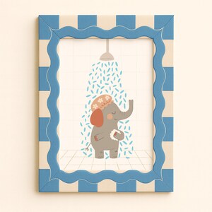 May include: A framed illustration of a gray elephant taking a shower. The elephant wears a floral shower cap and holds a white washcloth. The frame has a blue and white striped pattern.
