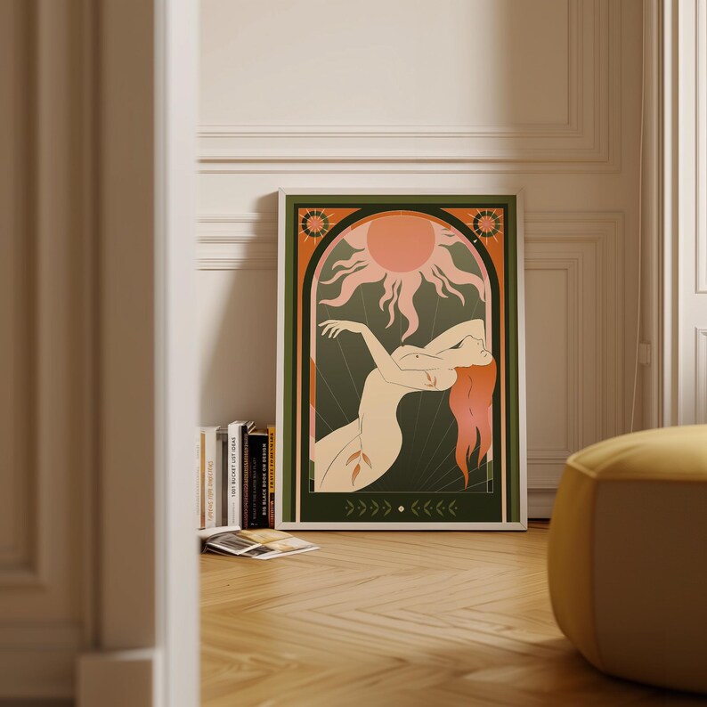 Celestial Sun Goddess art print framed and leaning against wall in bright minimal room with natural light.
