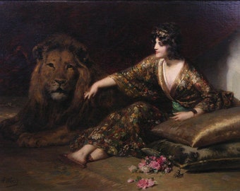 May include: An oil painting shows a woman in a floral robe reclining beside a lion. The woman wears a gold headpiece and rests on cushions. A bouquet of pink roses and a small decorative object are in the foreground.