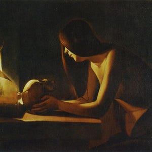 May include: An oil painting depicting a figure with long dark hair illuminated by a warm candle flame. The figure gazes down at a human skull held in their hands, with a book resting nearby. The scene is set against a dark, shadowed background.