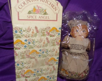 vintage Avon Spice Angel in original box sealed in plastic