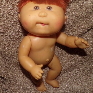 vintage  Cabbage Patch Baby all vinyl red head with tounge out to rehab