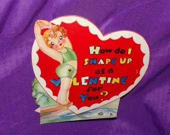 nadador de buceo mecánico antiguo vintage en forma de corazón de San Valentín firmado y fechado en 1938