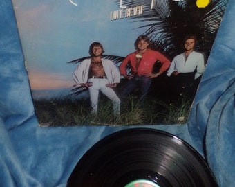 vintage Emerson Lake and Palmer Love Beach    album vinyl    lp record album