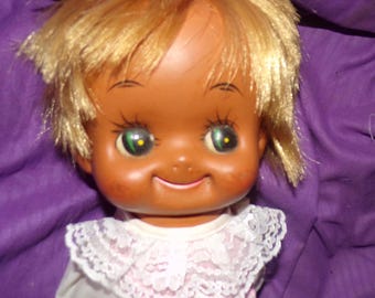 Vintage Made in Japan Big Eye Blonde Vinyl Doll in Vintage Outfit
