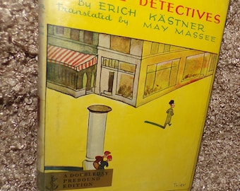 Emil y los detectives, de Erich Kästner - Edición de tapa dura de Puffin, 1930, con sobrecubierta.