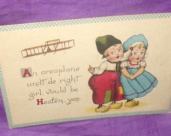 vintage antique cartoon postcard Dutch boy and girl used 1914 postmark 1 cent stamp