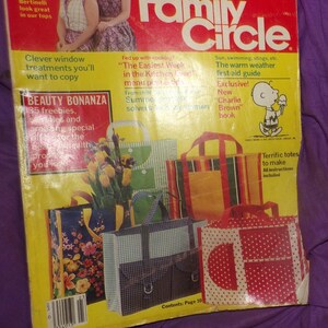 May include: A yellow and red magazine cover with the title "Family Circle" and a picture of a cartoon character holding an ice cream cone. The magazine cover features a variety of articles, including "The Easiest Week in the Kitchen Ever" and "Terrific Totes to Make".