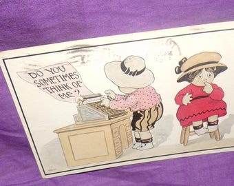 vintage antique cartoon postcard   boy and girl used 1900 early postmark 1 cent stamp