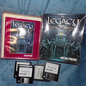 May include: Vintage computer game, "The Legacy: Realm of Terror," featuring a haunted house illustration on the box and floppy disks. The game box is red and black, with the game title in a gothic font. Includes several 3.5-inch floppy disks.