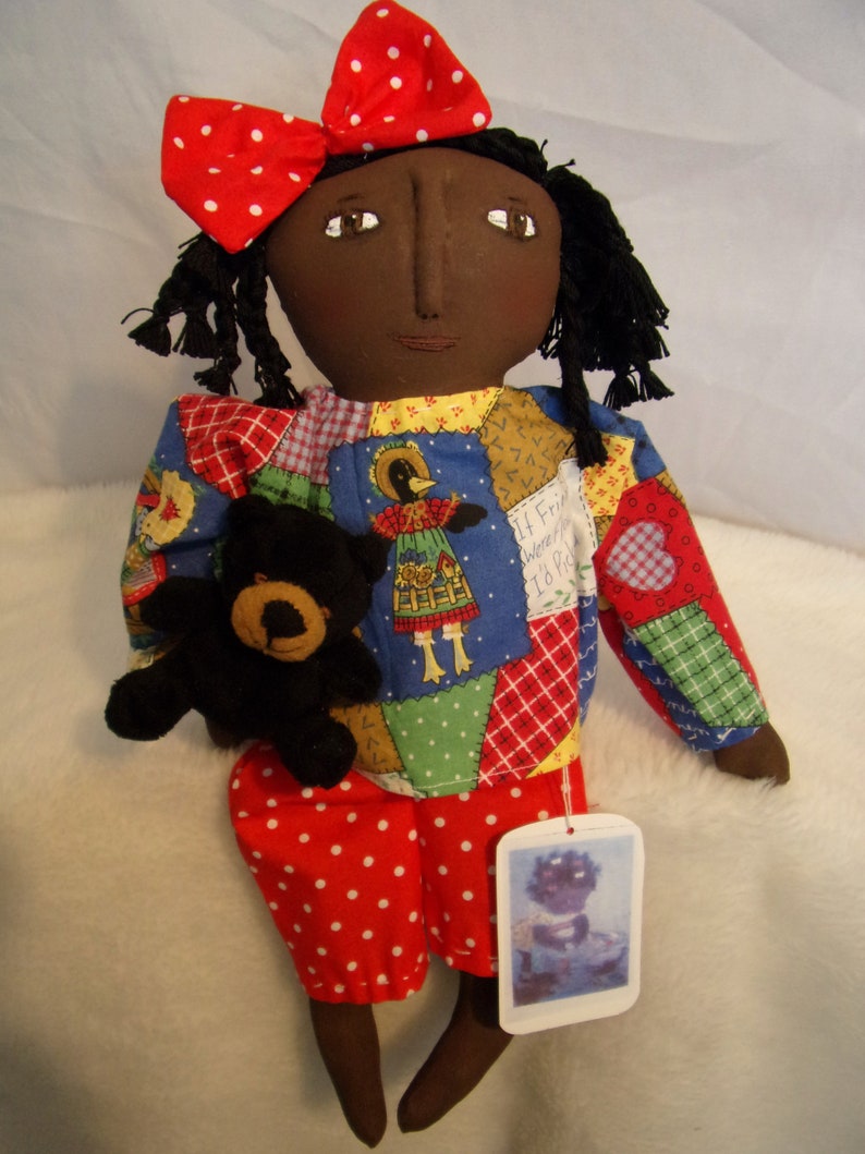 black fabric dolls