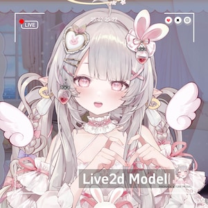 May include: A digital illustration of a character with long, silver hair and pink eyes. The character is adorned with bunny-themed accessories, including a hair bow and heart-shaped accents. The image includes the text "Live2d Model".