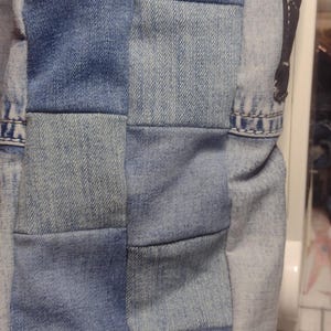 Checker pattern on sides and bottom of tote.