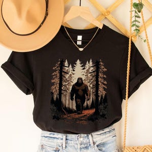 Bigfoot Forest Shirt, Sasquatch Camping T-Shirt, Mysterious Creature Outdoors Tee, Cryptid Lover Gift, Hiking and Adventure Bigfoot Tee