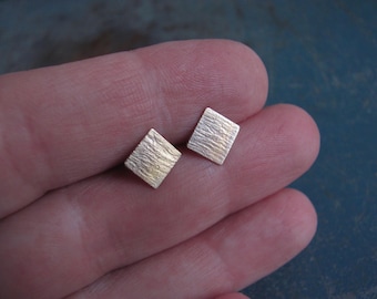 Handmade brass square stud earrings. Gold and silver post earrings.  Metalsmith jewelry by Margolladesign. Mixed metal stud earrings.
