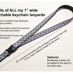 May include: A 1-inch wide detachable keychain lanyard with a purple, black, and white plaid pattern. The lanyard is 22 inches long and features a side-release buckle, a metal D-ring, and a split ring key ring. The text on the image says "Details of ALL my 1" wide detachable keychain lanyards."