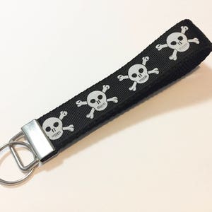 Keychain Black with White Skull and Cross Bones Keychain wristlet Key Fob 1" Wide