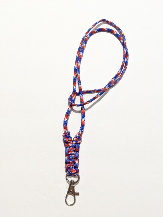 thumbnail image 2 of AGC Genuine British Army 4-Ply Single Cord Lanyard – Red & Dark Blue 2 of 4