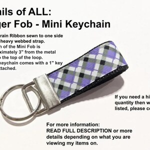 May include: Purple and white checkered grosgrain ribbon finger fob keychain with a silver key ring. The fob is approximately 3 inches long. Details of ALL: Finger Fob - Mini Keychain