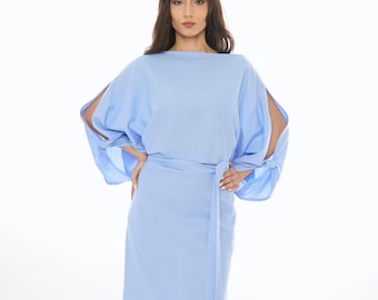May include: A light blue maxi dress with a tie belt and long sleeves with slits at the shoulders.