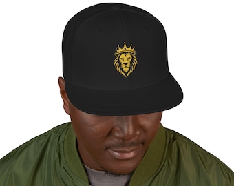 Gorra Snapback con bordado de león dorado / Gorra plana negra